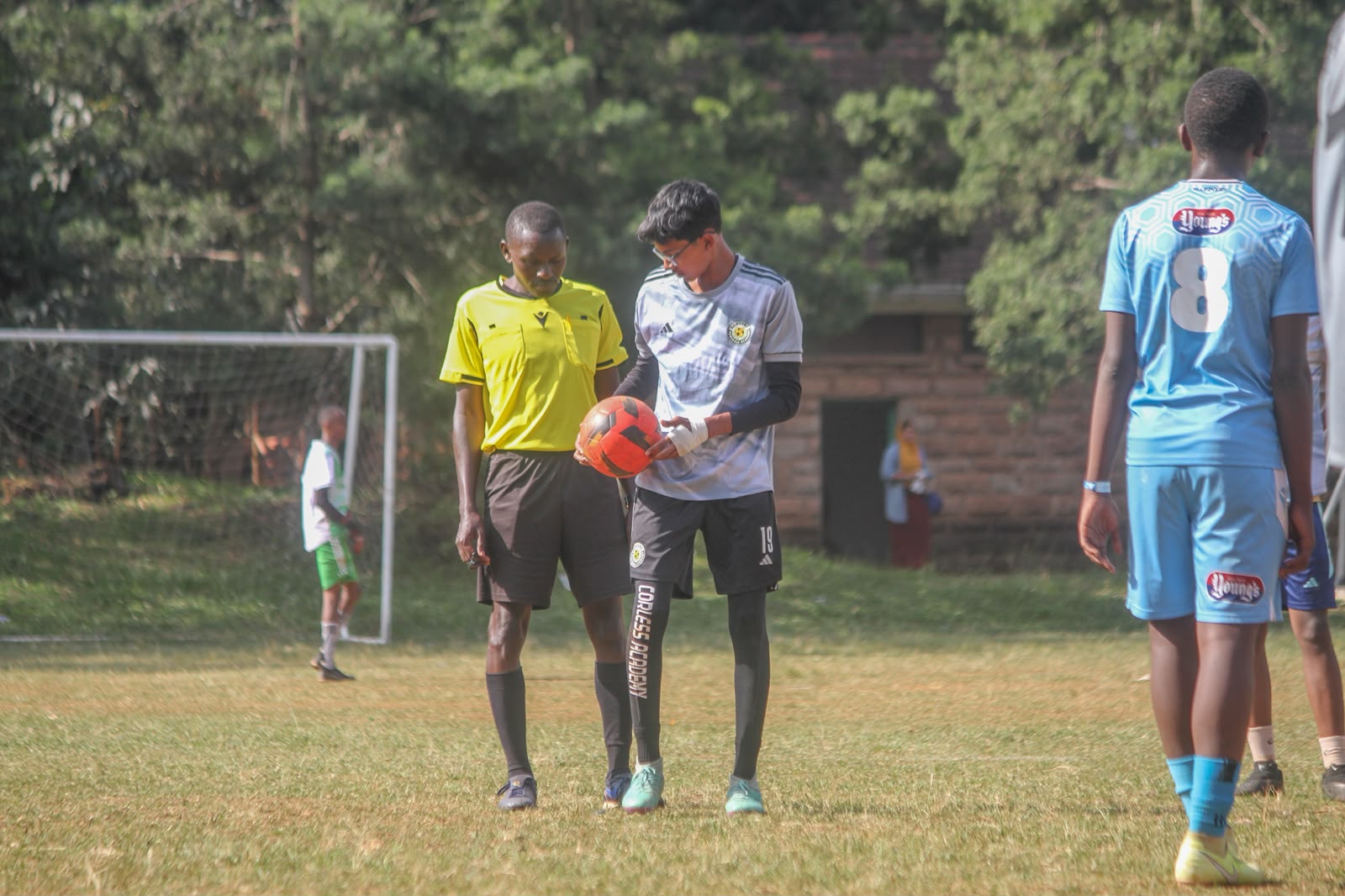 Rangers goalkeeper speaking with the referee before a restart