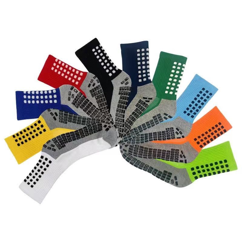 Fan of grip socks in red, blue, black, navy, green, sky blue, orange, lime, yellow and white